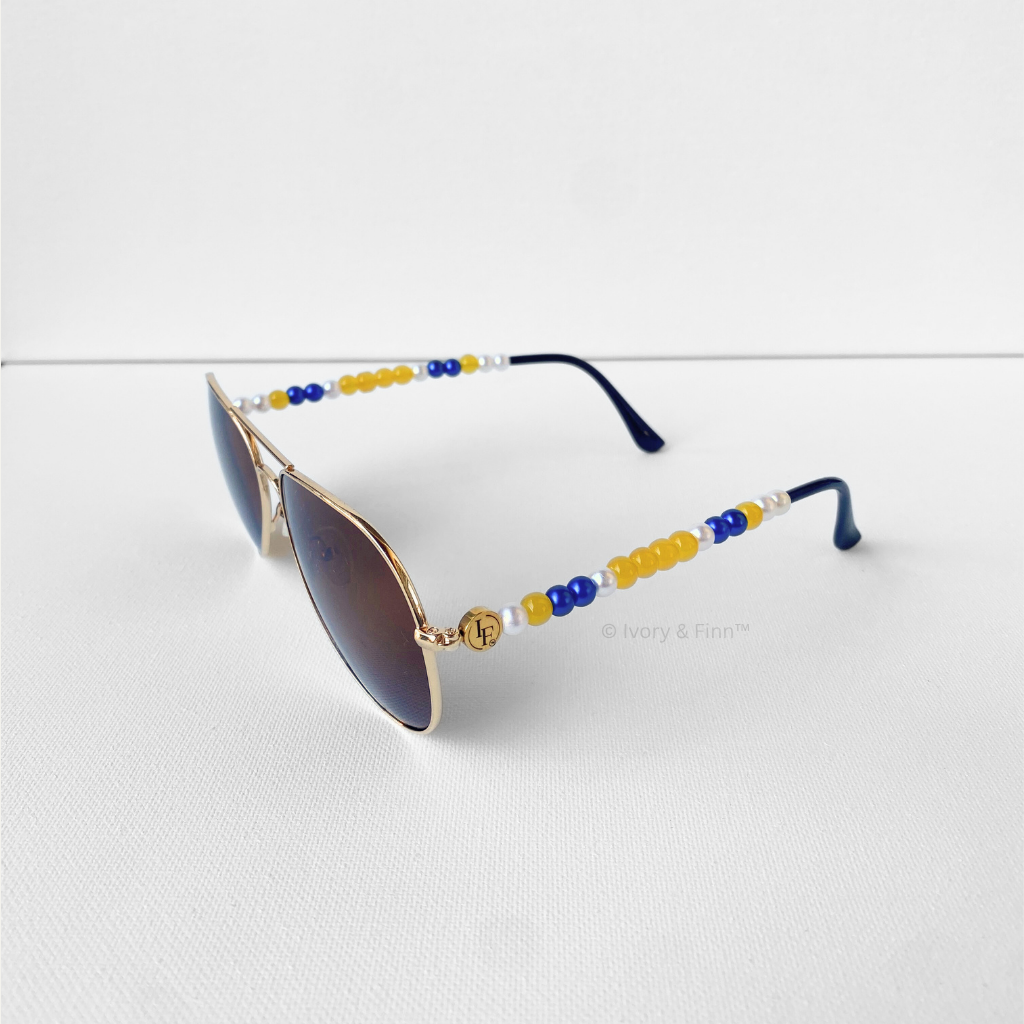 Yellow, blue, and pearl beaded aviator sunglasses by Ivory & Finn™ – All The Buzz style